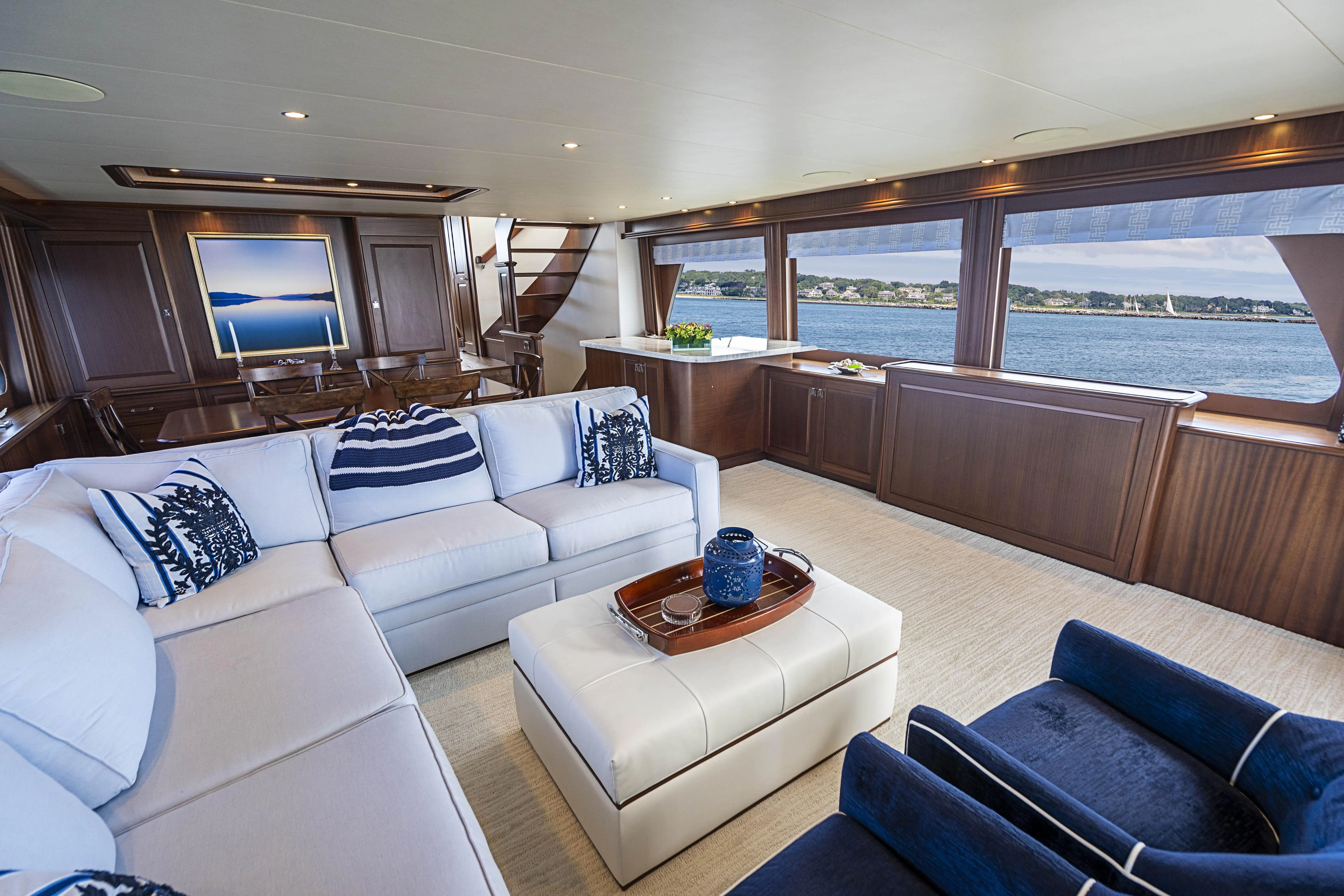 a living room with a large window aboard CARPE DIEM Yacht for Sale