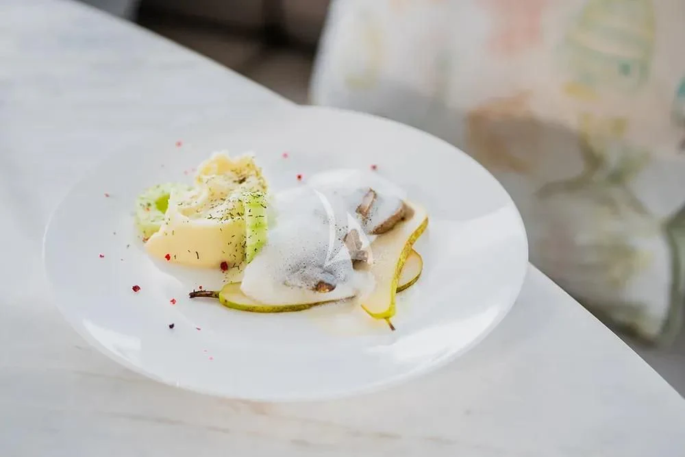 a plate of food aboard CARPE DIEM Yacht for Sale