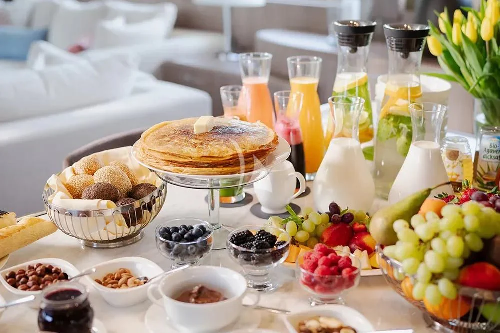 a table with food and drinks aboard CARPE DIEM Yacht for Sale