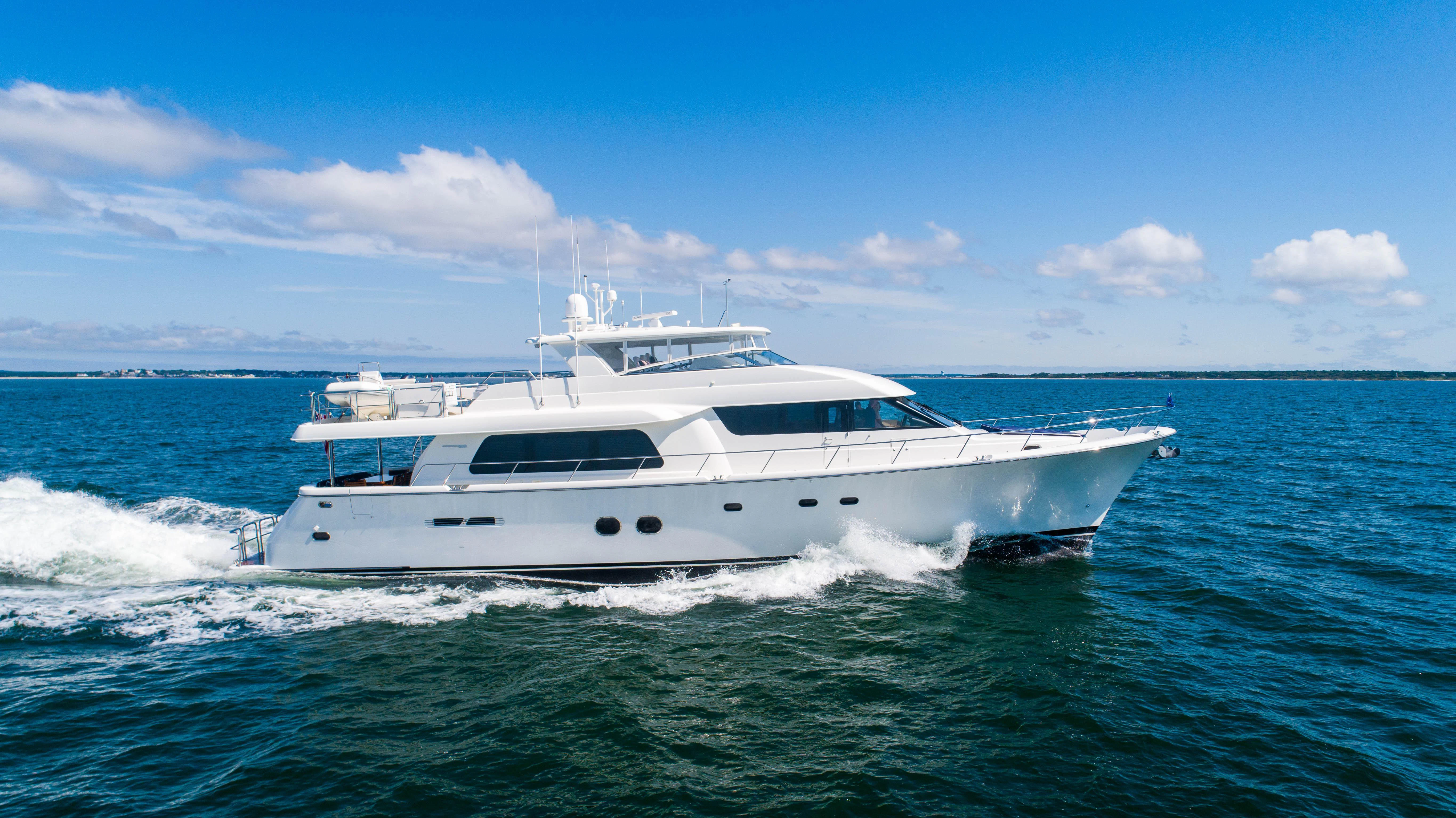 a white yacht in the water aboard CARPE DIEM Yacht for Sale