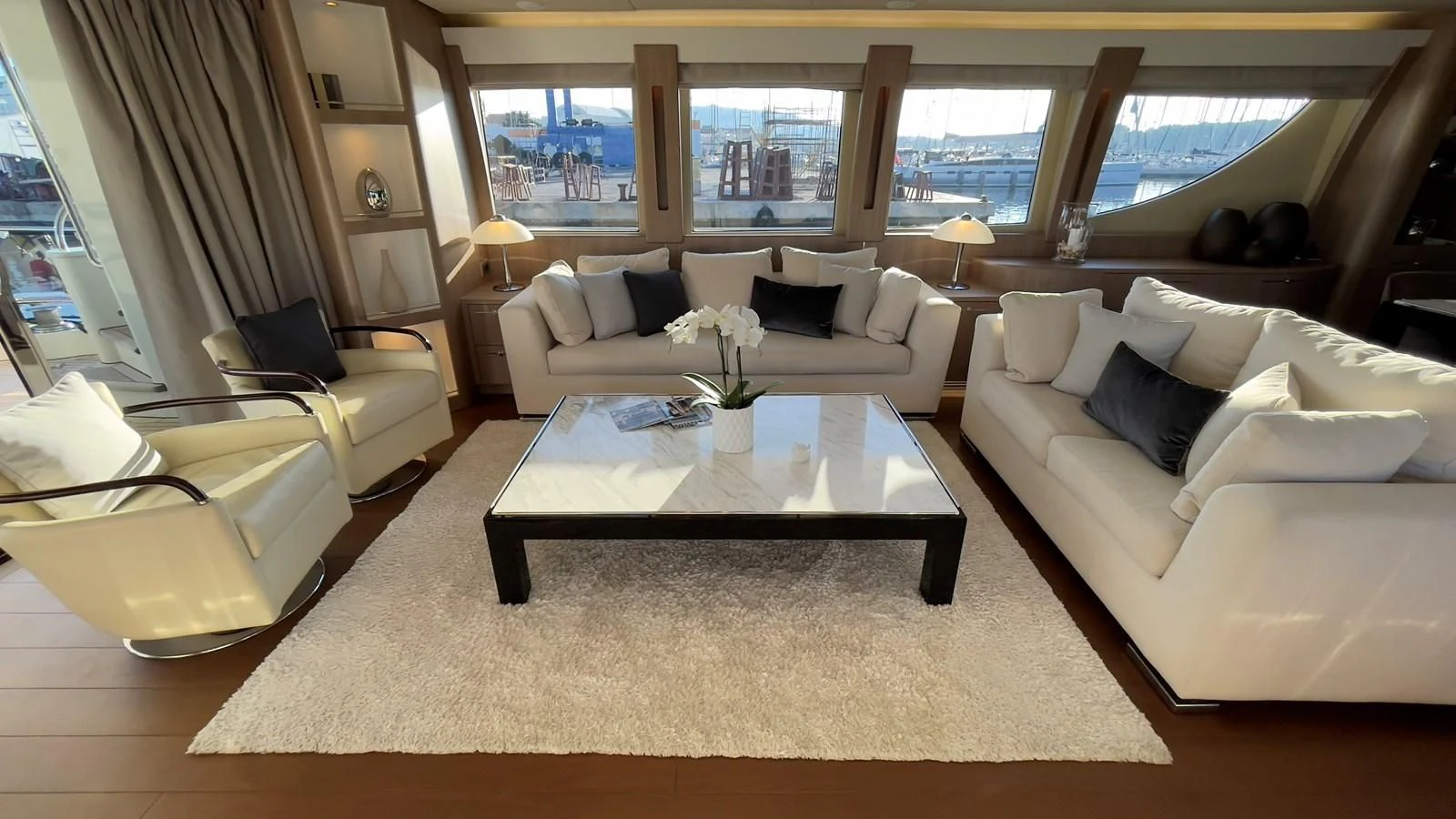 a living room with a large window aboard CARPE DIEM Yacht for Sale