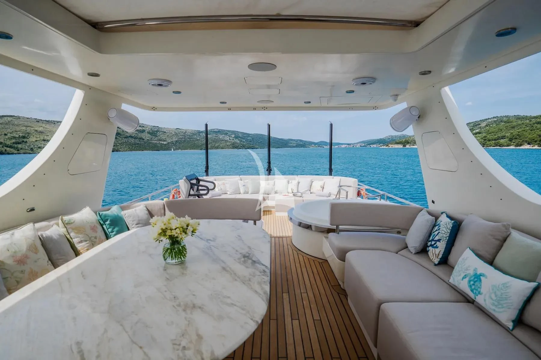 a room with a table and chairs aboard CARPE DIEM Yacht for Sale