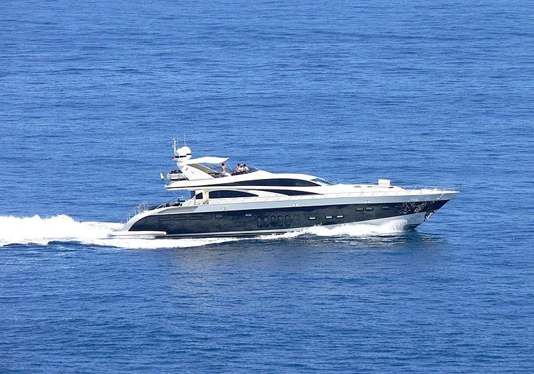 a white yacht in the water aboard CARPE DIEM Yacht for Sale