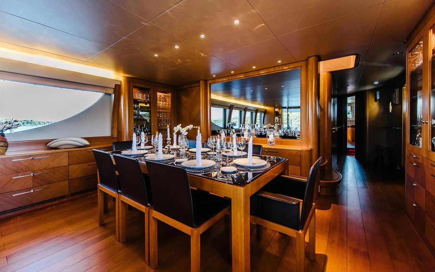 a dining room with a table and chairs aboard CARPE DIEM Yacht for Sale