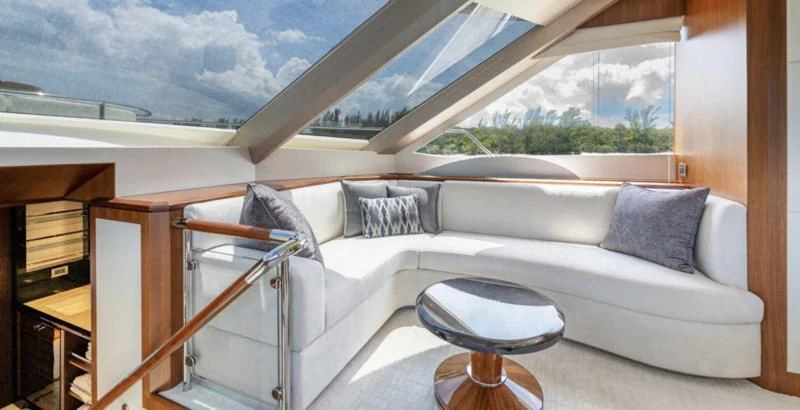 a couch in a room aboard ZEPHYR Yacht for Charter