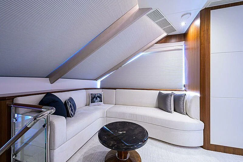 a room with a couch and a table aboard ZEPHYR Yacht for Charter