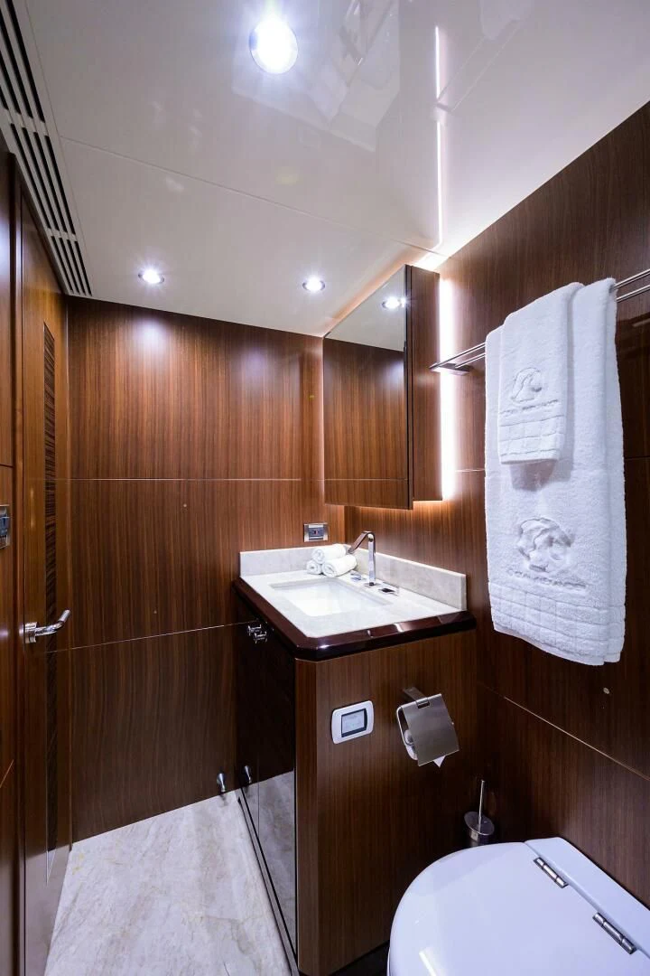 a bathroom with wooden walls aboard ZEPHYR Yacht for Charter