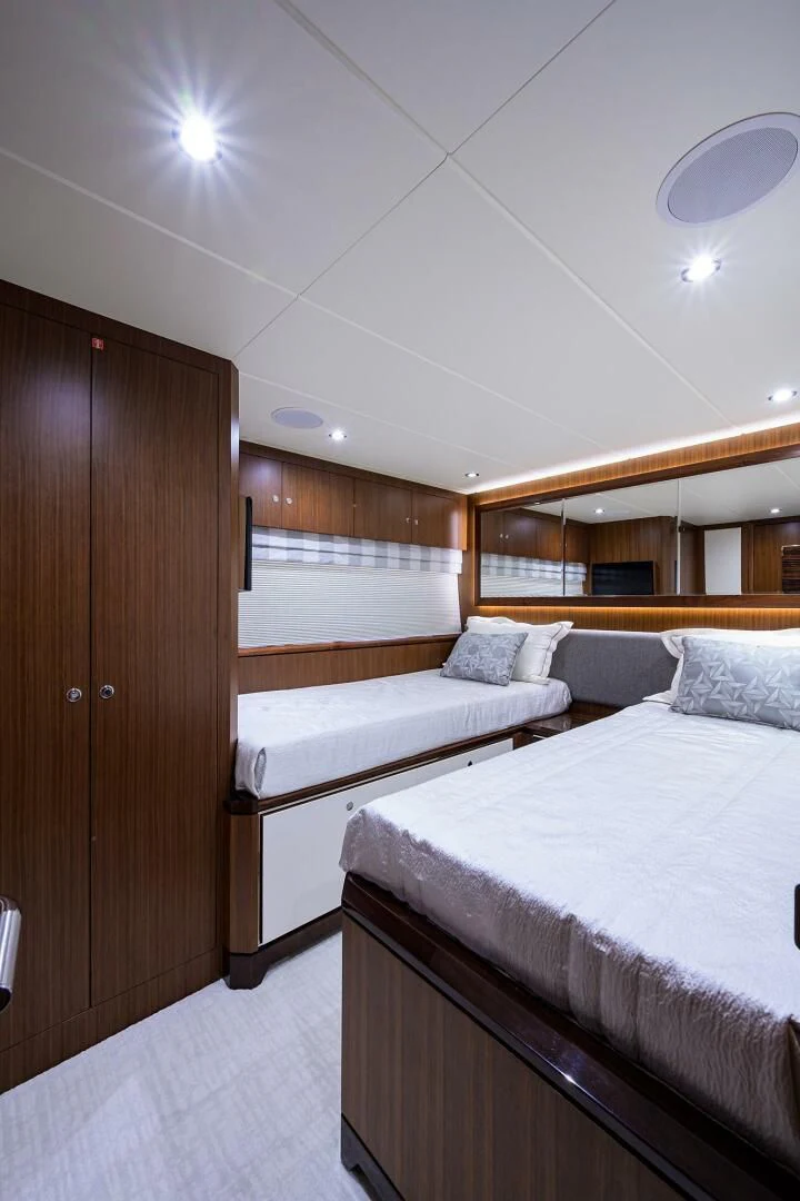 a room with two beds aboard ZEPHYR Yacht for Charter