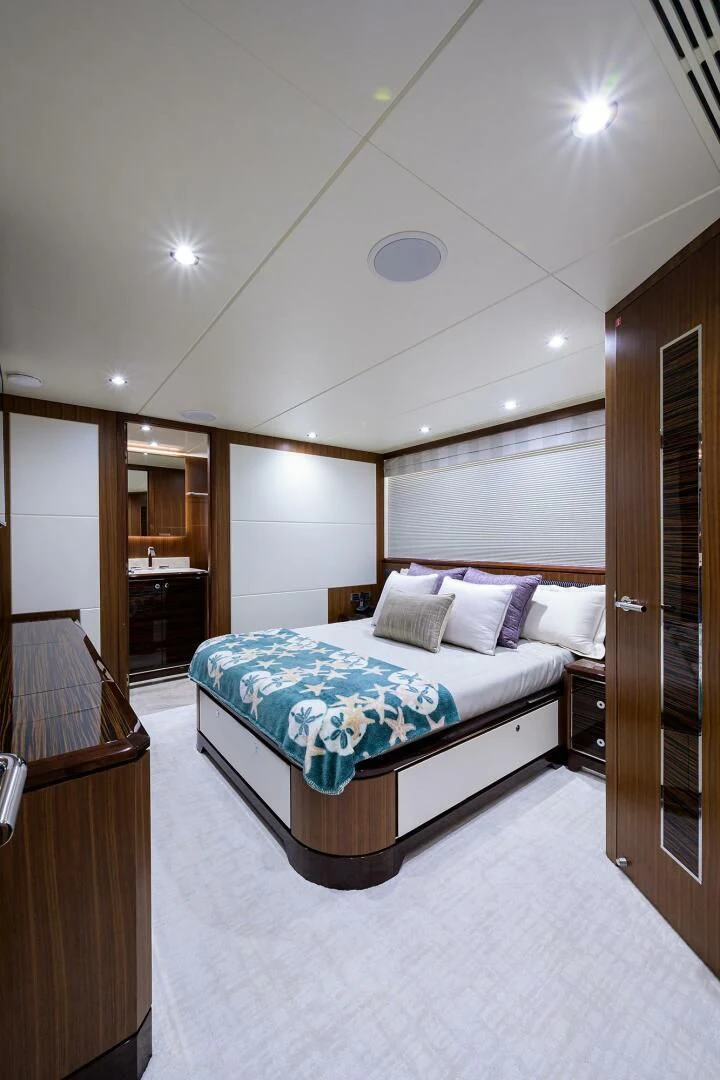 a bed in a room aboard ZEPHYR Yacht for Charter