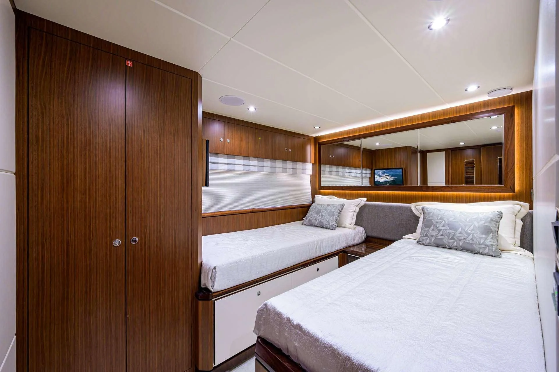 a room with two beds aboard ZEPHYR Yacht for Charter