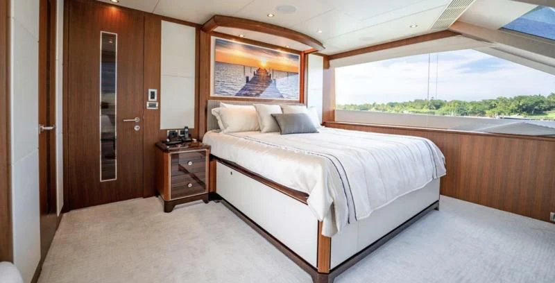 a bed in a room aboard ZEPHYR Yacht for Charter