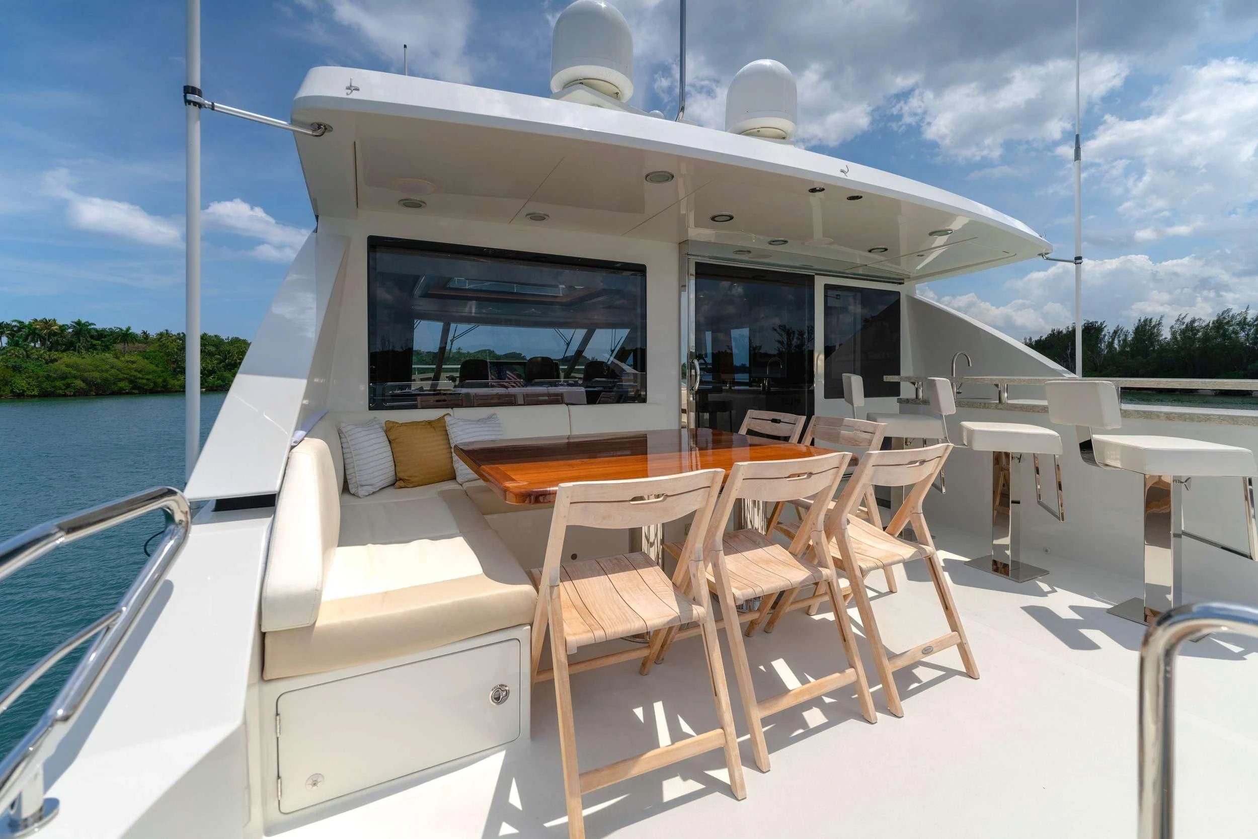 a boat with chairs on the deck aboard ZEPHYR Yacht for Charter