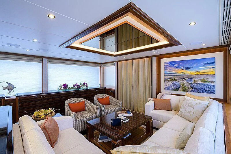 a living room with a large window aboard ZEPHYR Yacht for Charter