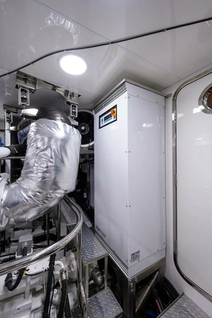 a few people in a room aboard ZEPHYR Yacht for Charter