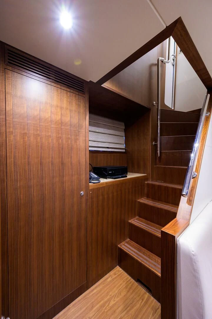 a wooden staircase in a room aboard ZEPHYR Yacht for Charter