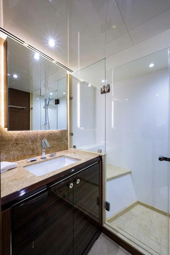 a bathroom with a sink and a mirror aboard ZEPHYR Yacht for Charter