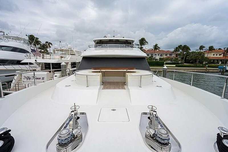 a building with a dome roof and a boat parked in the front aboard ZEPHYR Yacht for Charter