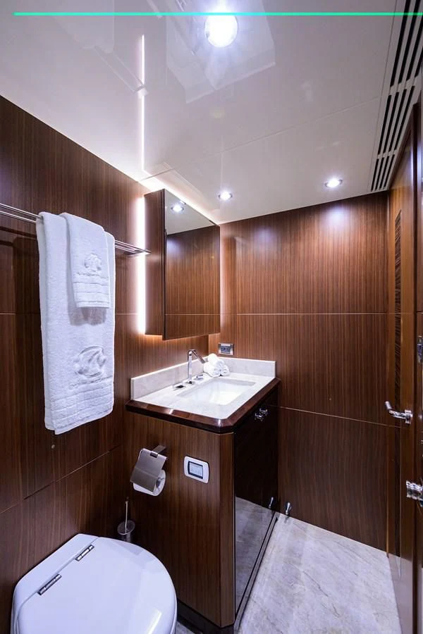 a bathroom with wooden walls aboard ZEPHYR Yacht for Charter