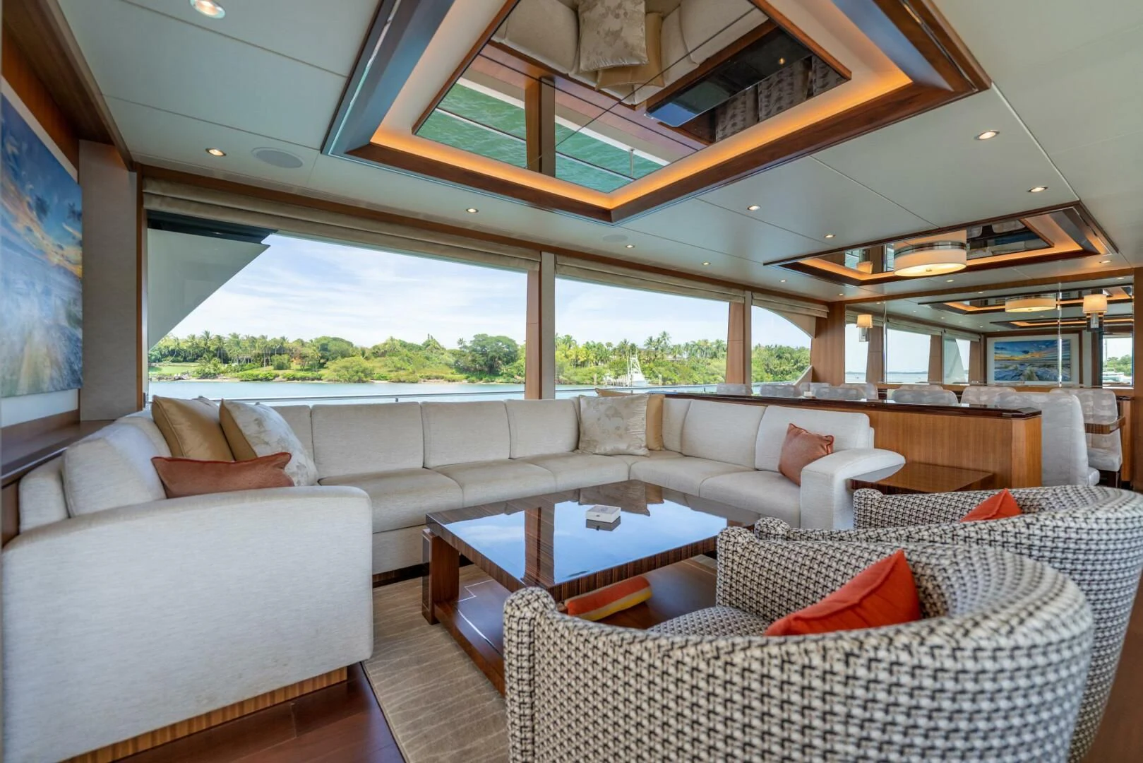 a living room with a large window aboard ZEPHYR Yacht for Charter