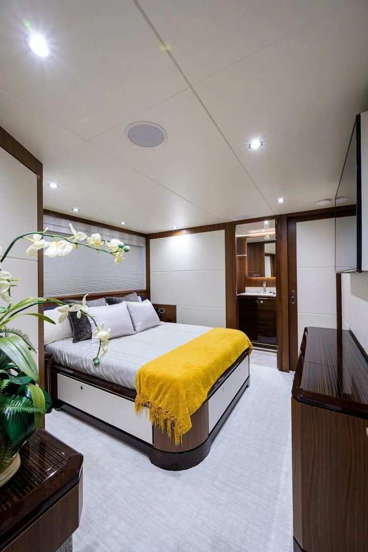 a bed in a room aboard ZEPHYR Yacht for Charter