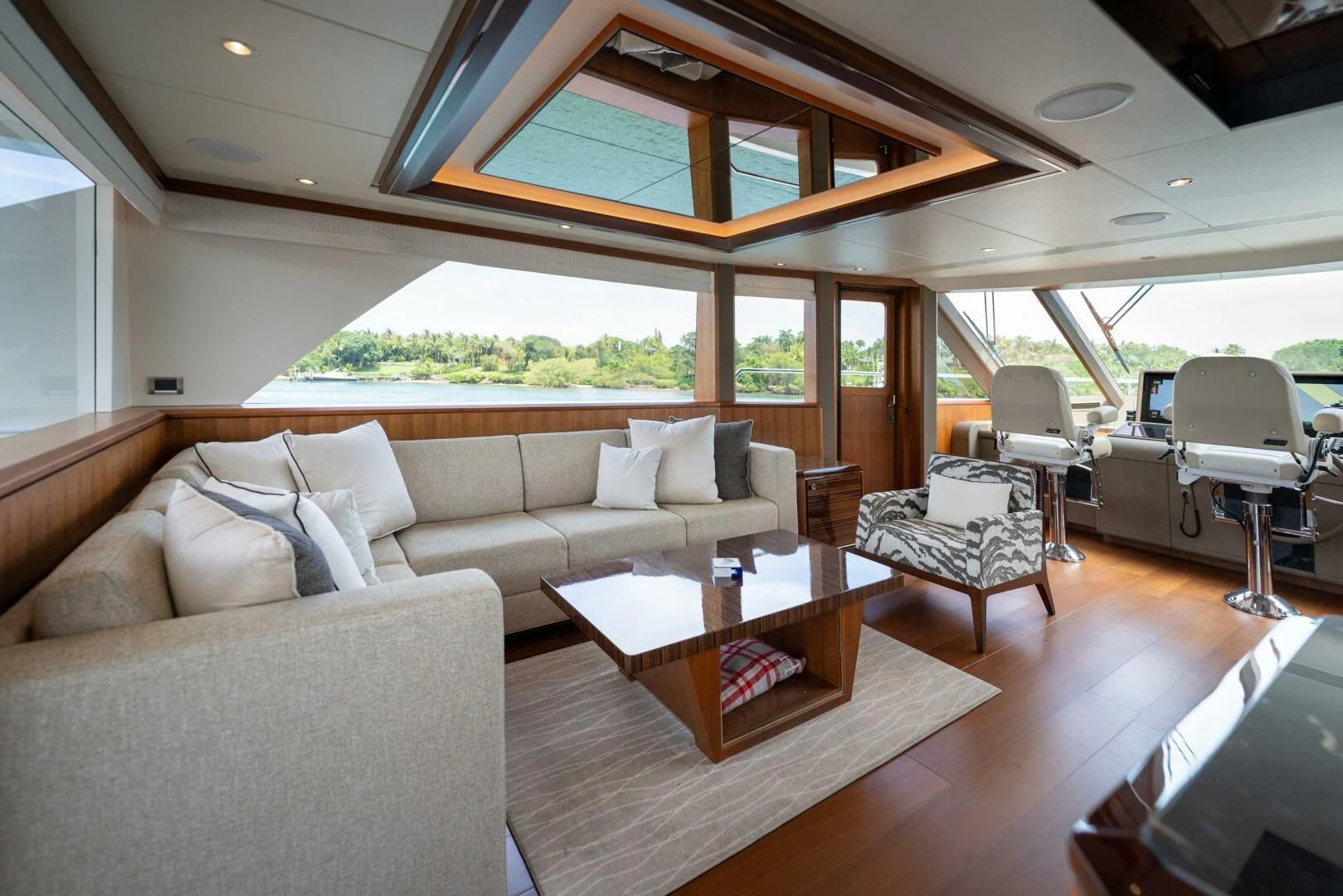 a living room with a couch and a table aboard ZEPHYR Yacht for Charter