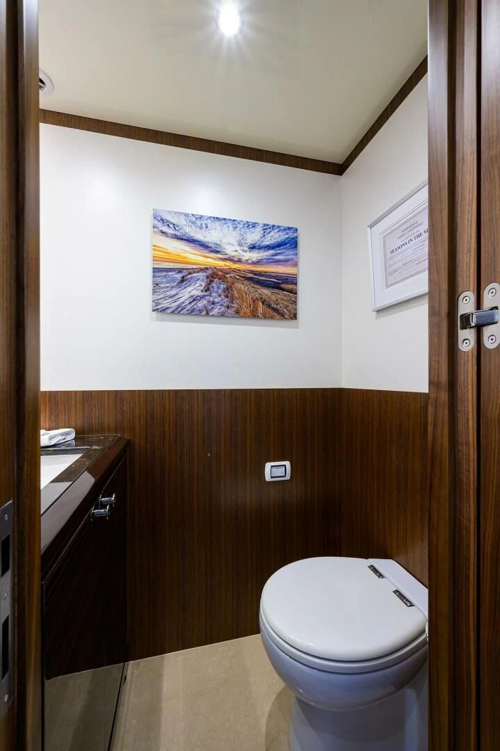 a toilet in a bathroom aboard ZEPHYR Yacht for Charter