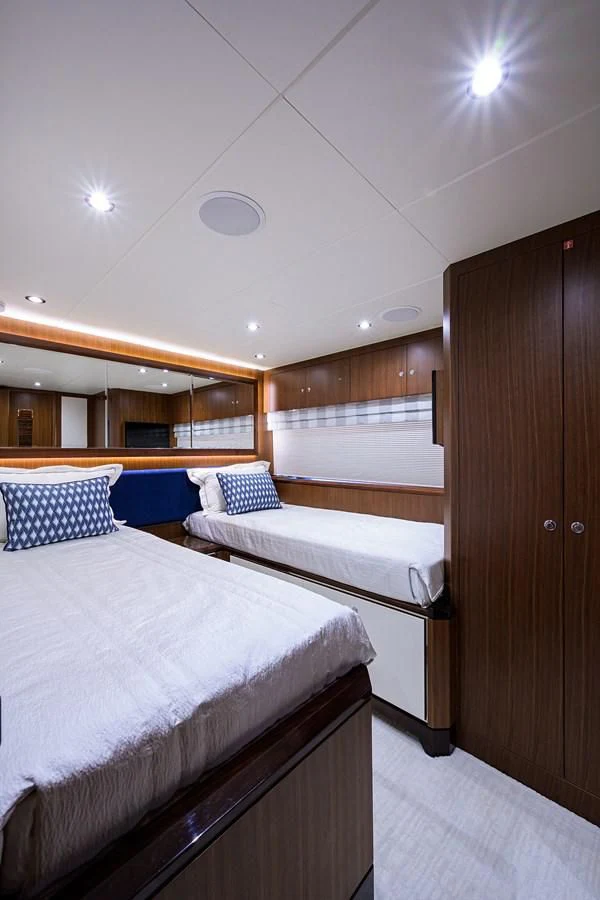 a room with two beds aboard ZEPHYR Yacht for Charter