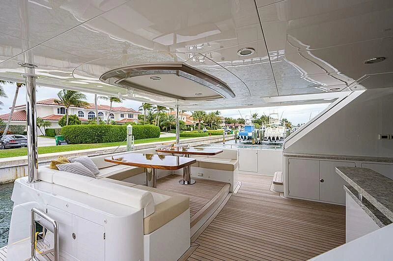 a room with a table and chairs aboard ZEPHYR Yacht for Charter