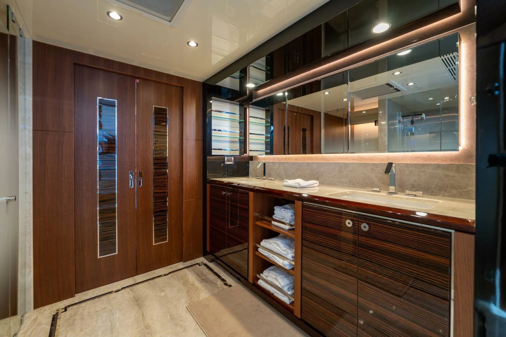 a kitchen with wooden cabinets aboard ZEPHYR Yacht for Charter