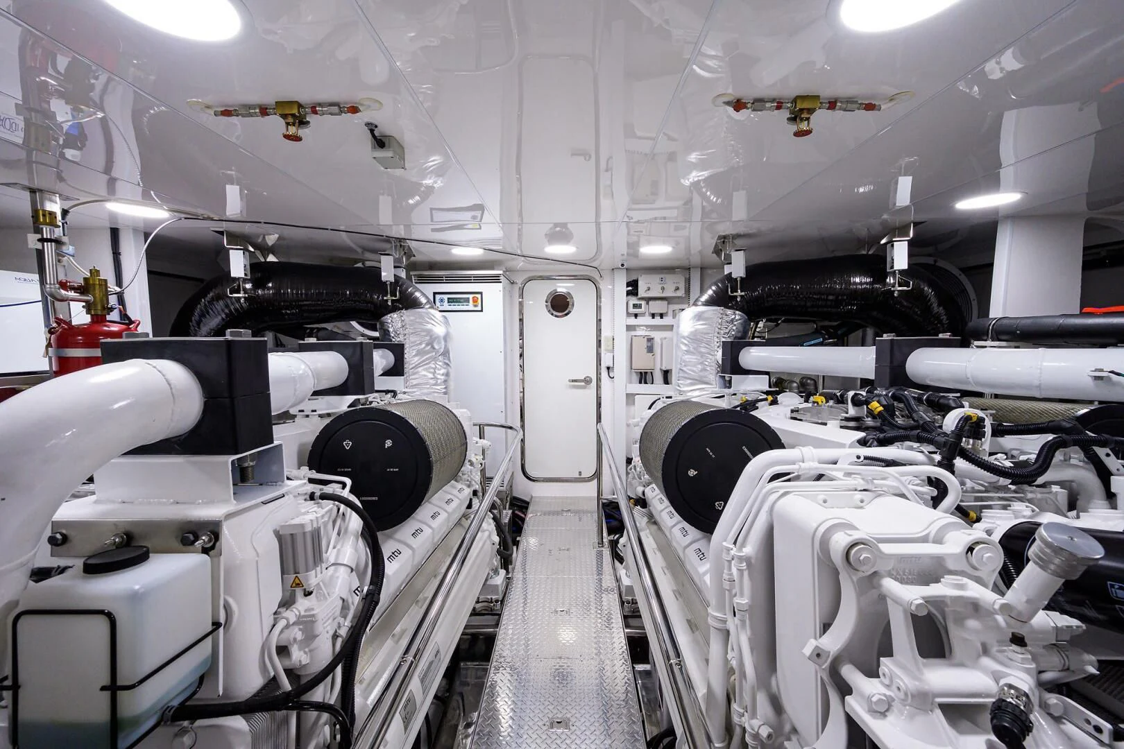 a room with machines and equipment aboard ZEPHYR Yacht for Charter