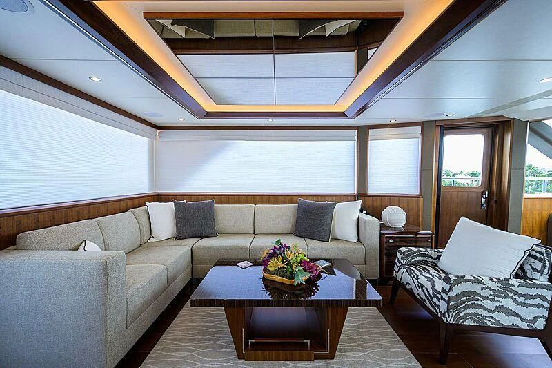 a living room with a couch and a table aboard ZEPHYR Yacht for Charter