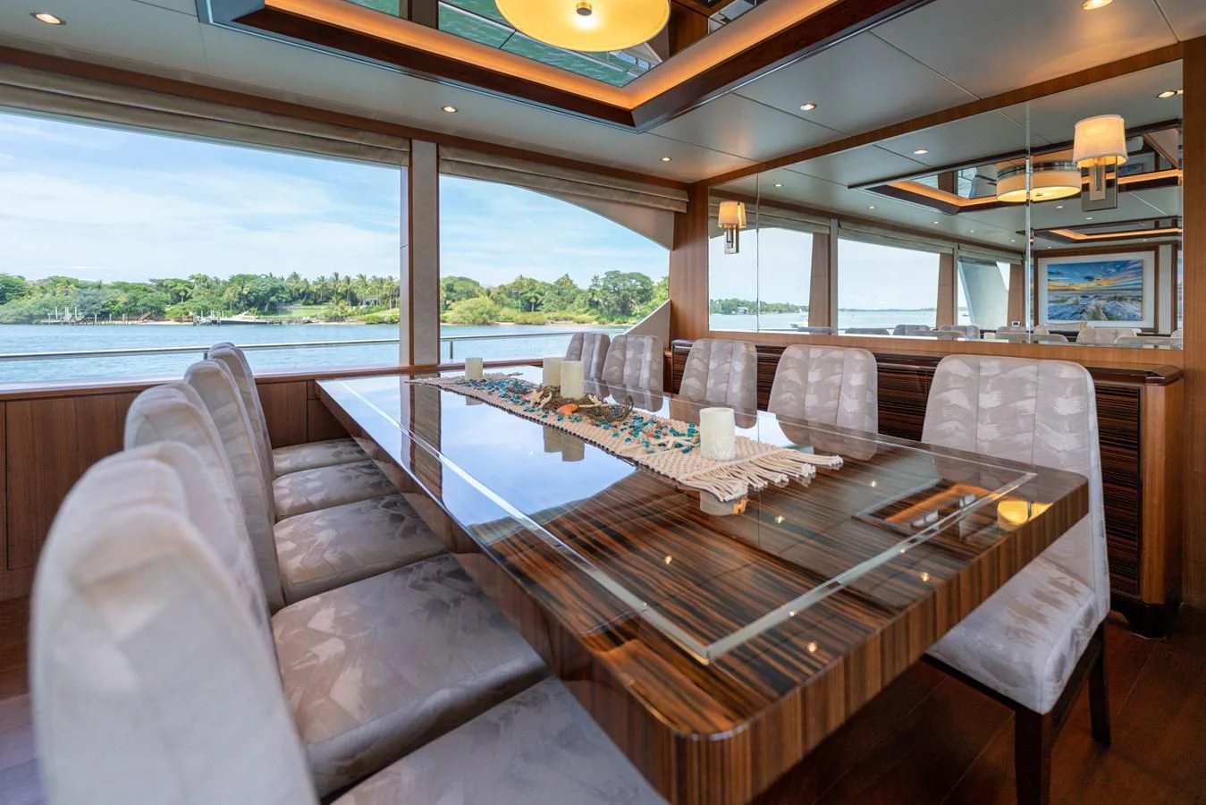 a living room with a large table aboard ZEPHYR Yacht for Charter