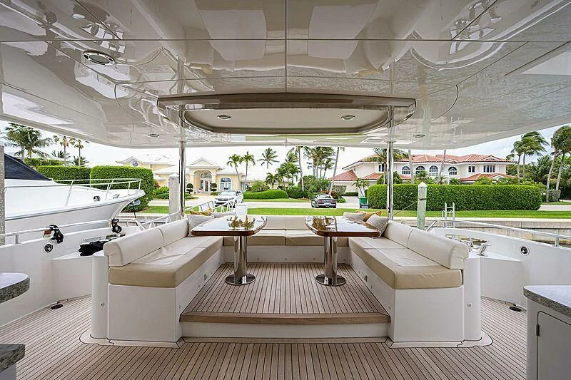 a room with a table and chairs aboard ZEPHYR Yacht for Charter