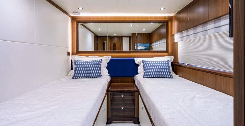 a room with two beds aboard ZEPHYR Yacht for Charter