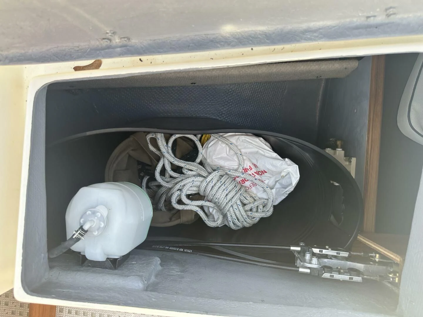 a suitcase full of clothes aboard ZEPHYR Yacht for Charter