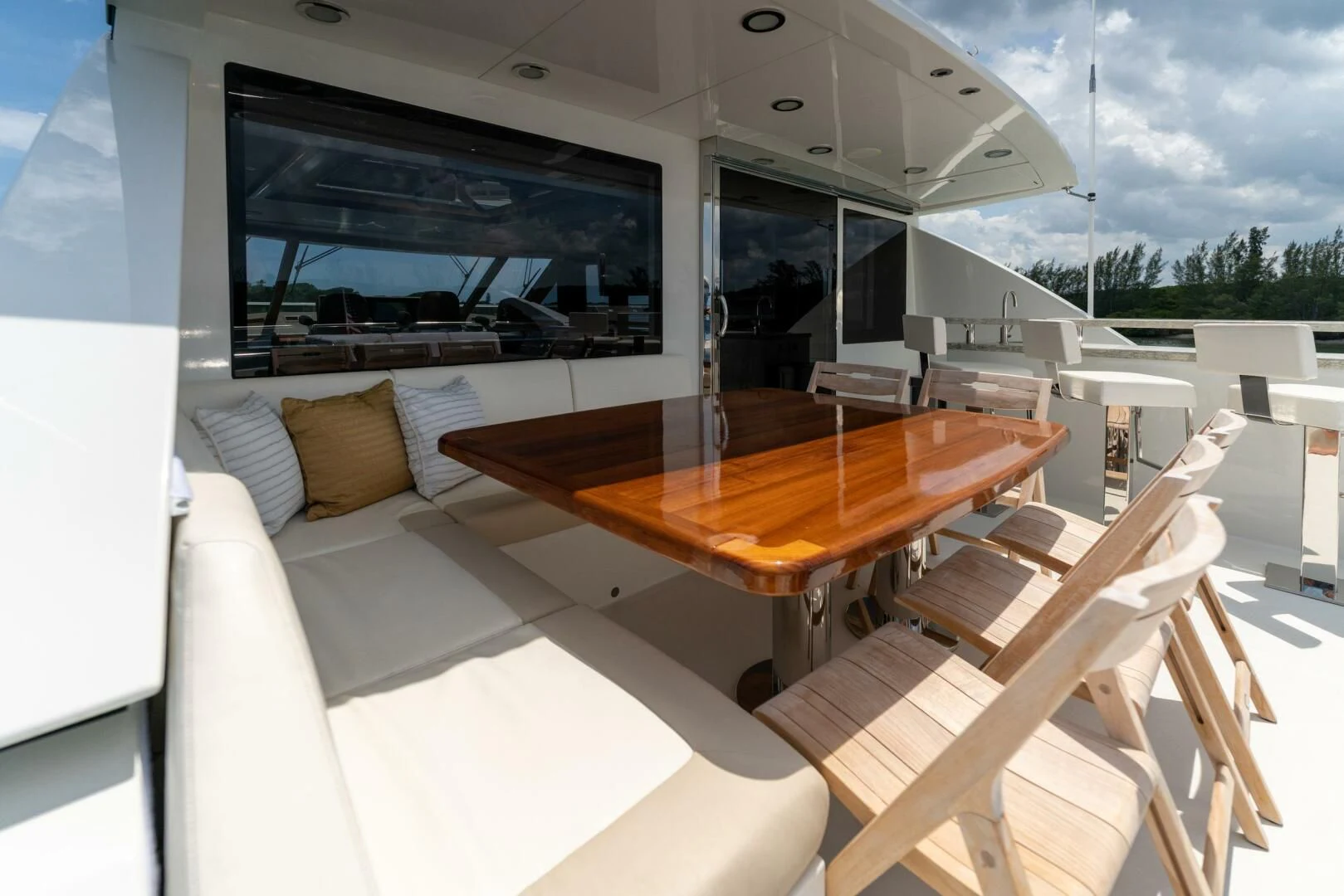 a room with a table and chairs aboard ZEPHYR Yacht for Charter