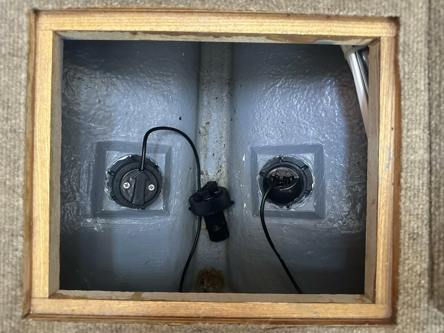 a pair of speakers in a wooden box aboard ZEPHYR Yacht for Charter