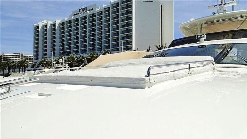 a white car parked on a snowy road aboard PRATA DO LYS Yacht for Sale