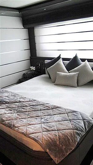 a bed with pillows aboard PRATA DO LYS Yacht for Sale