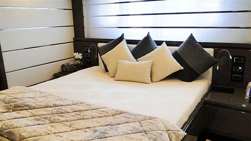 a bed with pillows aboard PRATA DO LYS Yacht for Sale