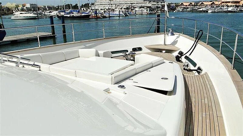 a white boat on a deck aboard PRATA DO LYS Yacht for Sale