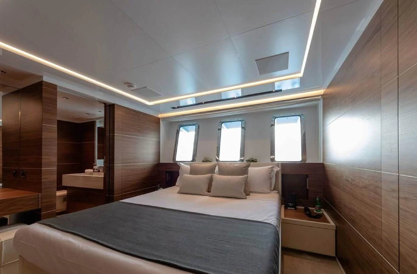a bed in a room aboard LADY A Yacht for Sale
