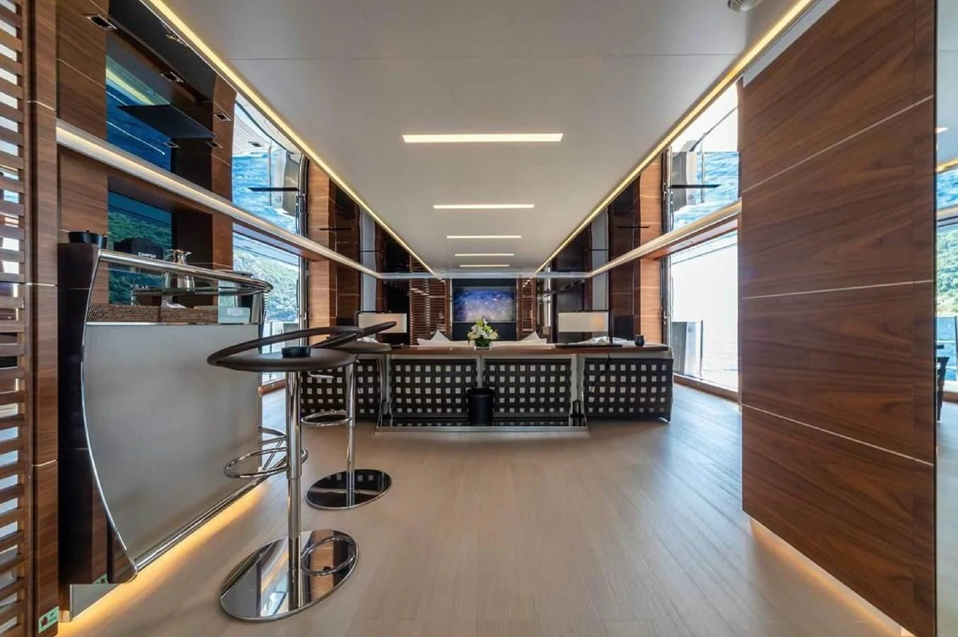 a room with a table and chairs aboard LADY A Yacht for Sale