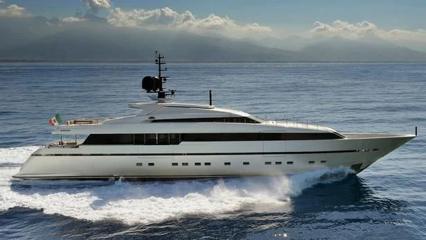 a white yacht in the ocean aboard LADY A Yacht for Sale