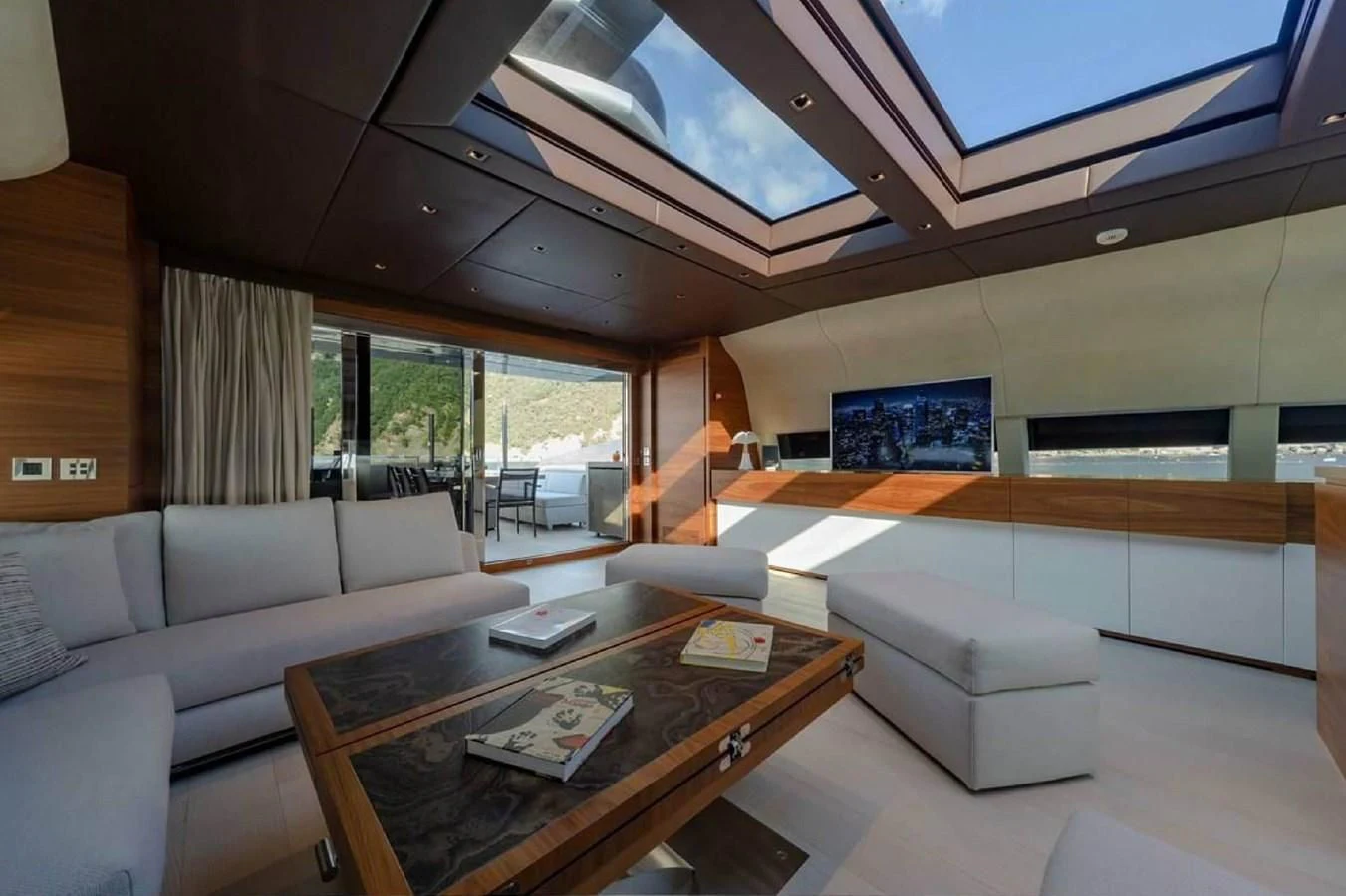 a living room with a large ceiling aboard LADY A Yacht for Sale
