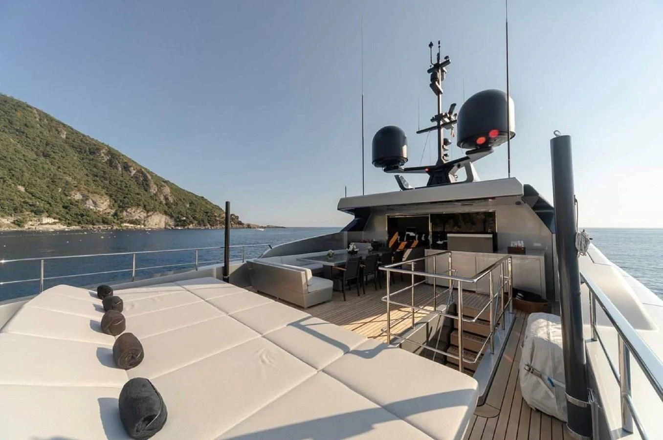 a boat with a large machine on the deck aboard LADY A Yacht for Sale