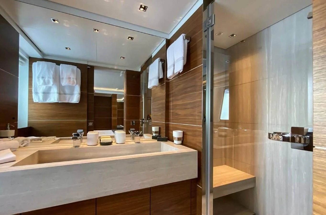 a bathroom with a large mirror aboard LADY A Yacht for Sale