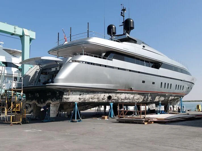 a large white boat aboard LADY A Yacht for Sale