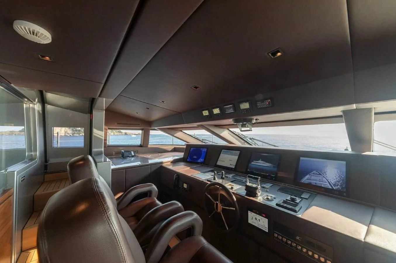 inside of a vehicle with many monitors aboard LADY A Yacht for Sale