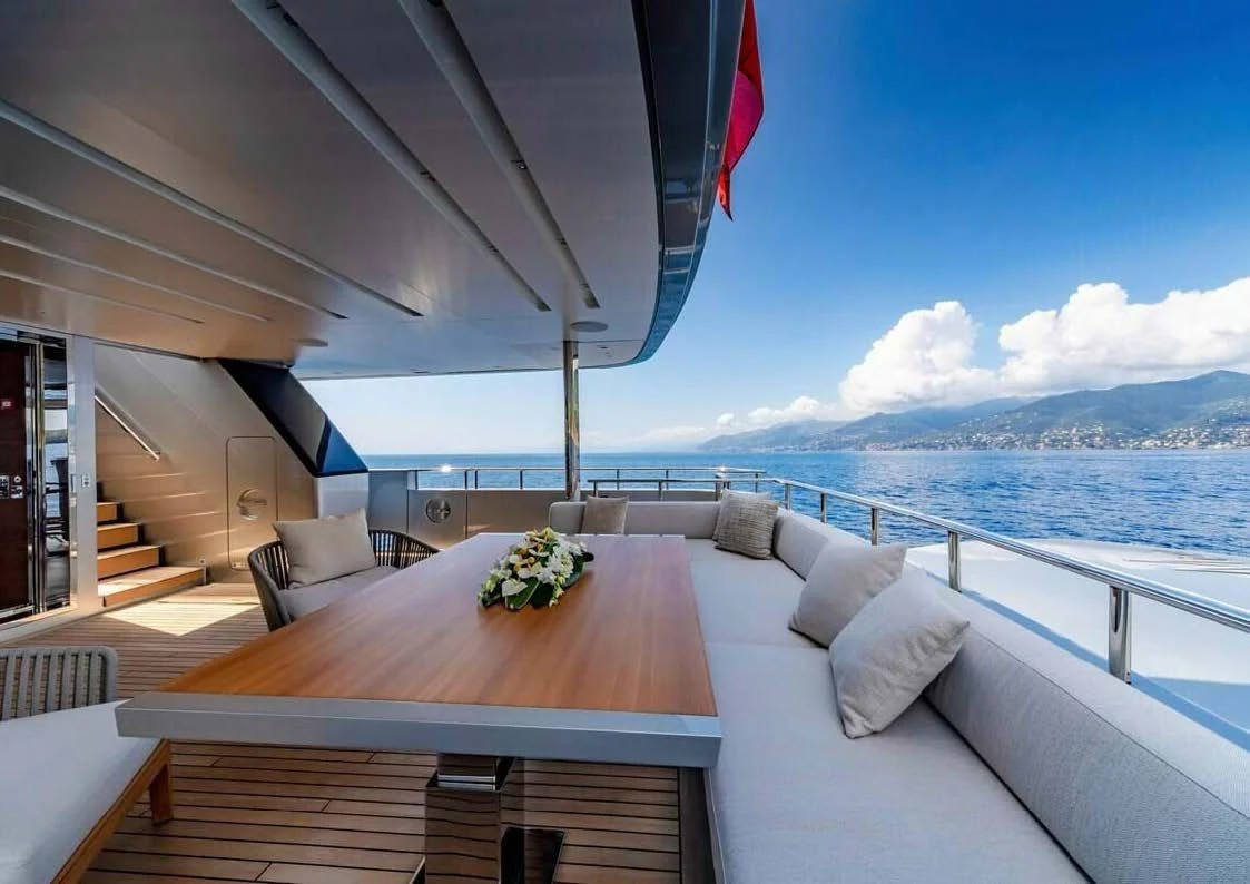 a large balcony overlooking a body of water aboard LADY A Yacht for Sale
